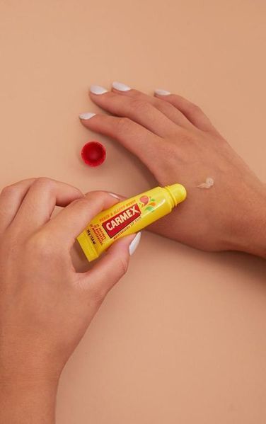 Бальзам для губ CARMEX зі смаком персику та манго, туба, 10 мл NC000388 фото