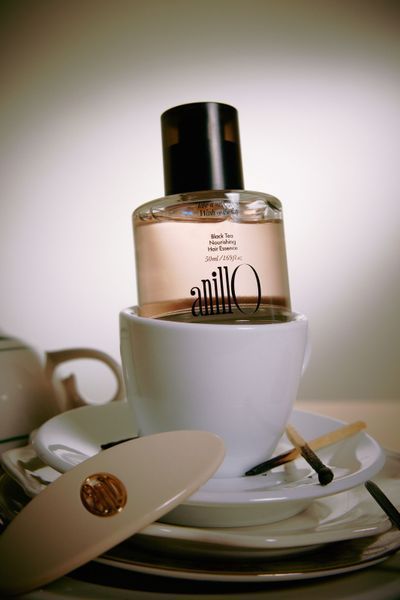 Живильна есенція для волосся з екстрактом чорного чаю ANILLO Black Tea Nourishing Hair Essence, 50 мл NC002980 фото